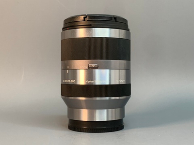 Sony E 18-200mm 3.5-6.3 OSS точки внутри передней линзе