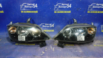 Фара передняя левая MAZDA DEMIO 2002-2005