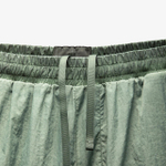NLN_GMD_SHRTS Metal Effect Green