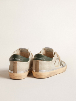 Super Star in gray canvas with a green leather star and heel tab