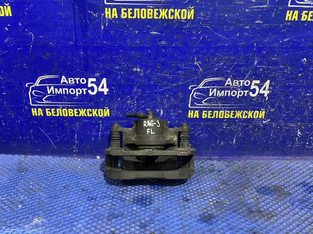 Суппорт тормозной передний левый Honda ODYSSEY 2001