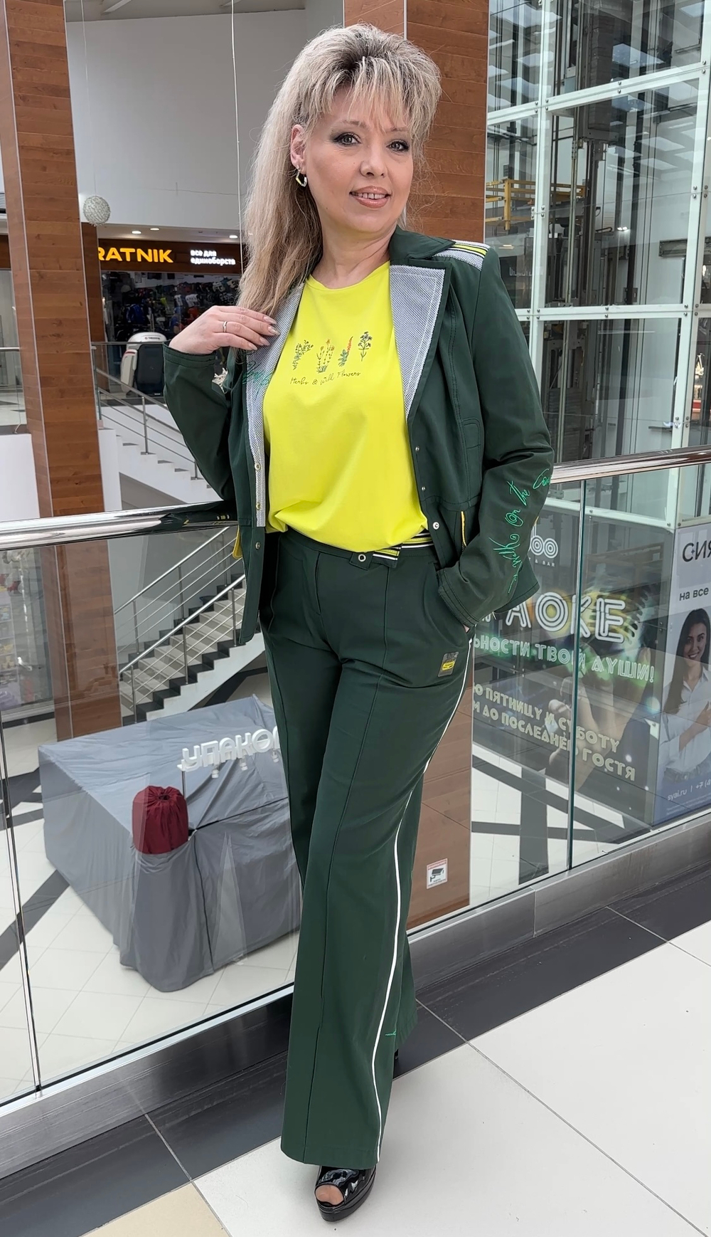 Австрийские брюки-палаццо с лампасами в изумрудном цвете