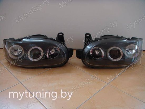 Передние фары Ford Escort 7 angel eyes black