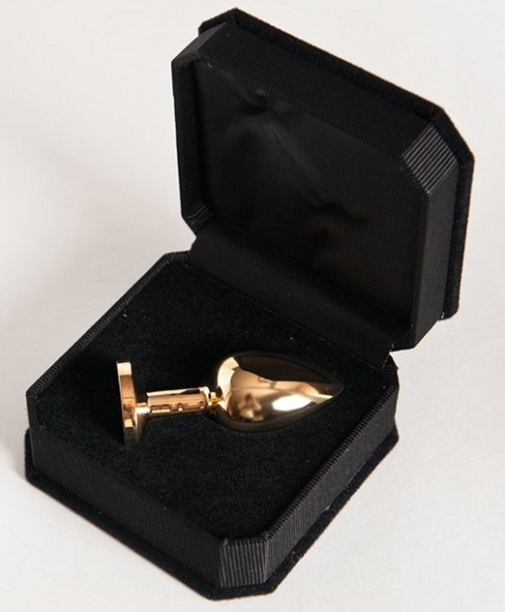 Маленькая золотистая анальная втулка с чёрным кристаллом