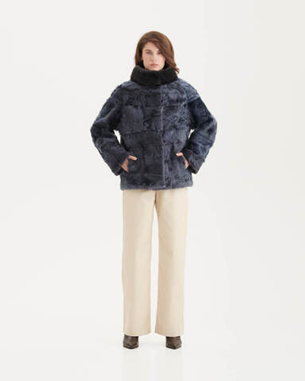 Шуба из меха козы с отделкой из меха норки