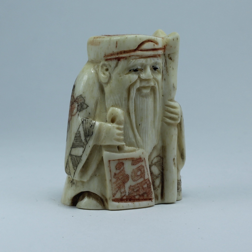 Нэцкэ Дзюродзин с волшебным посохом и иероглифом счастье