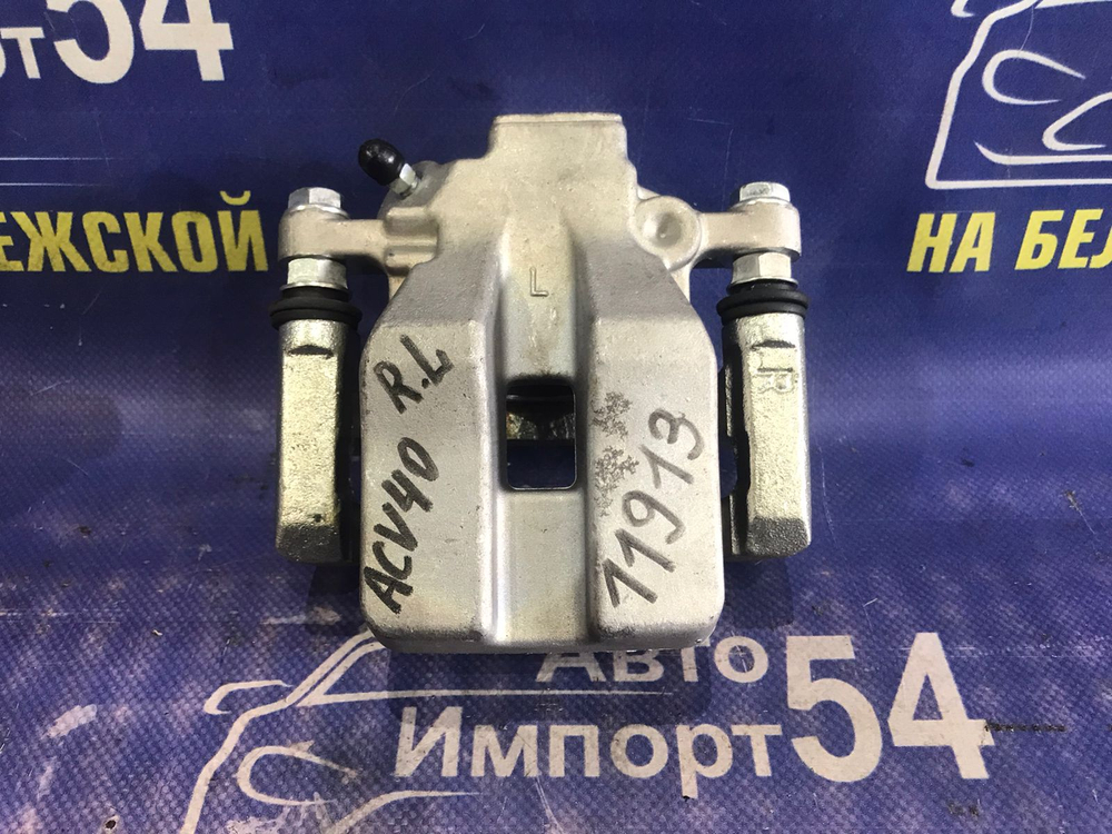 Суппорт тормозной задний левый TOYOTA CAMRY 2006-2007