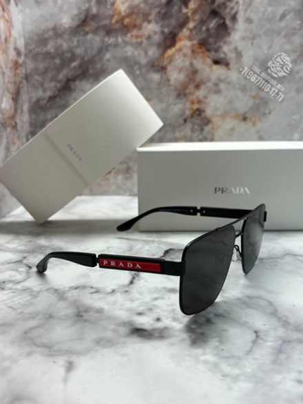 Солнечные очки Prada