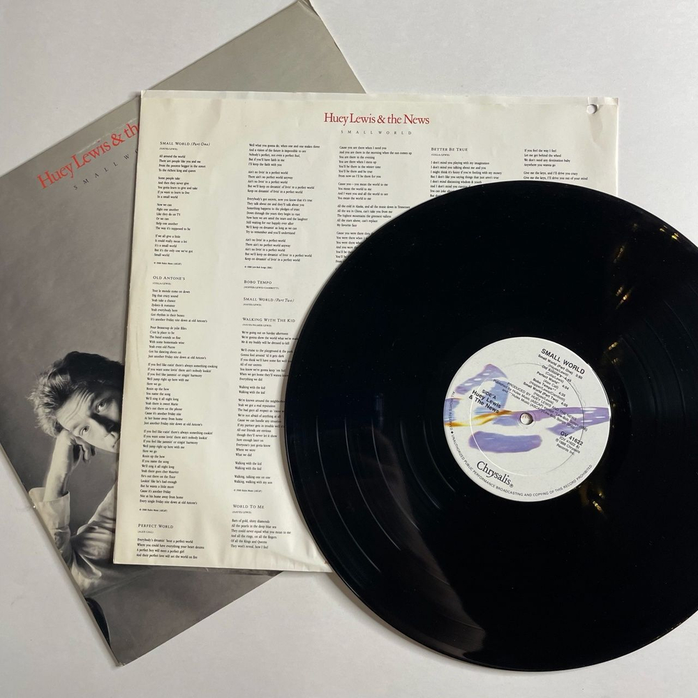 Винтажная виниловая пластинка LP Huey Lewis and The News Small World (USA 1988)