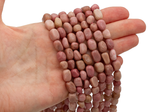 Нить бусин из родонита 7х9мм (галтовка)