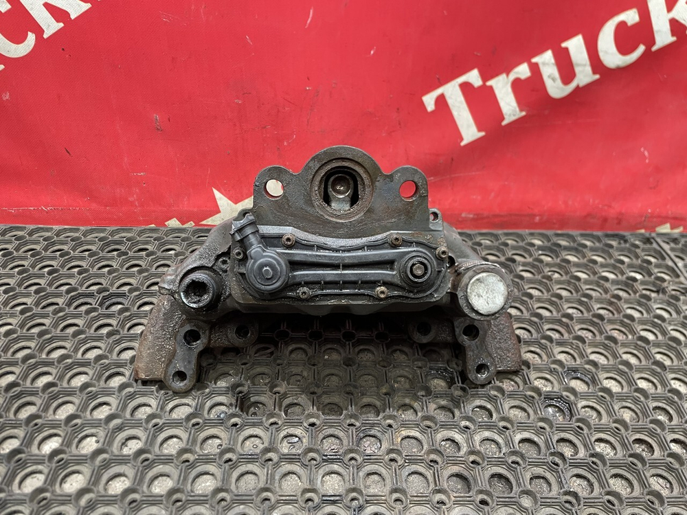 Суппорт задний левый