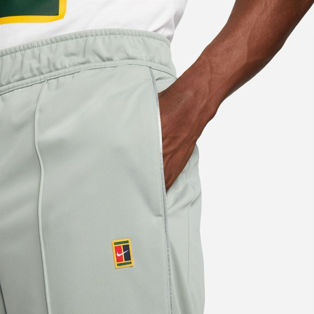 Мужские теннисные штаны Nike Court Heritage Suit Pant - mica green