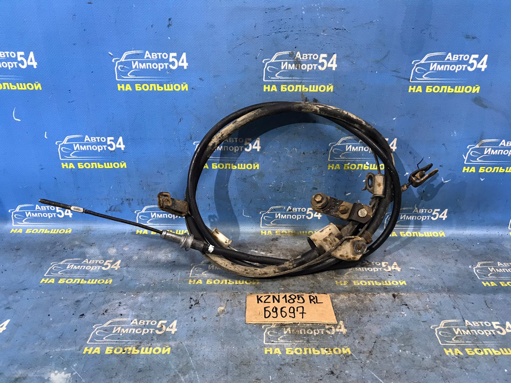 Трос ручника левый TOYOTA HILUX SURF 1998-2002