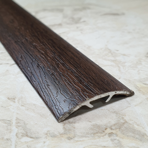 Порог-стык 30мм "DO-4" 2,7м Орех (31) ламинир. алюм.