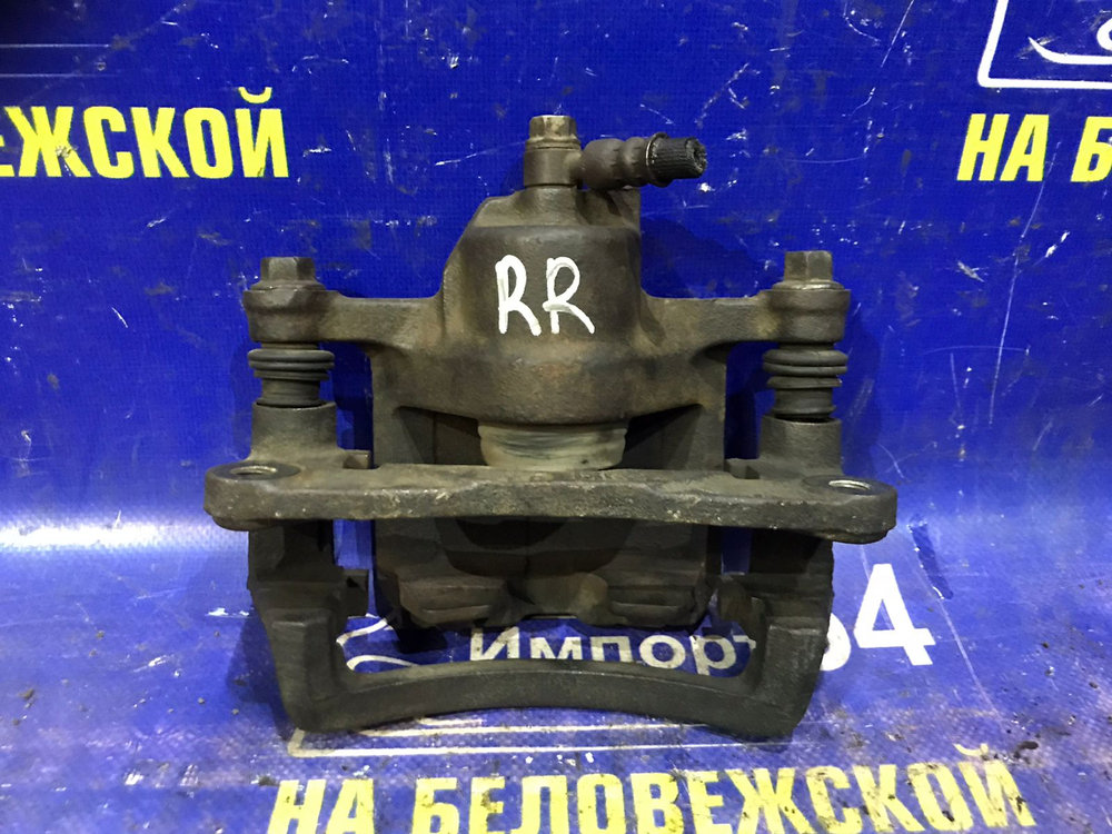 Суппорт тормозной задний правый MAZDA MPV 1997