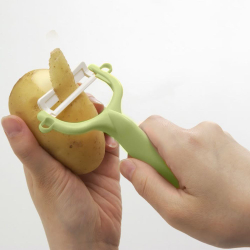 Нож для чистки с плавающим лезвием Kyocera Kitchen accessories зеленый Япония фото