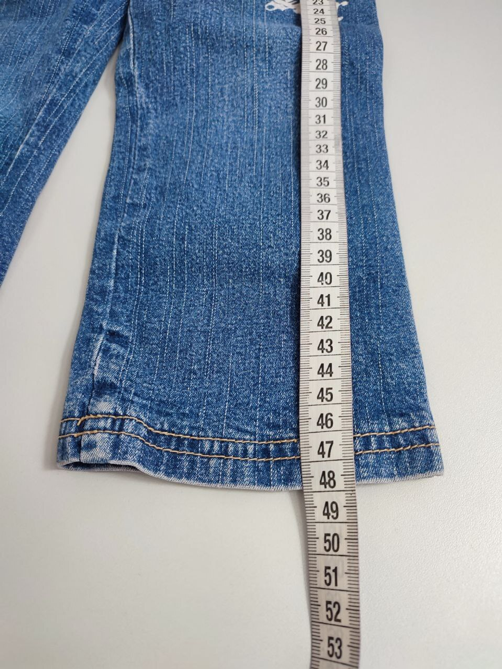 Джинсы с надписью на 2 года