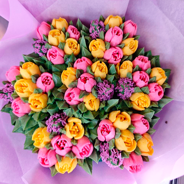 "Палитра весны" - букет из 7 капкейков в элегантной упаковке