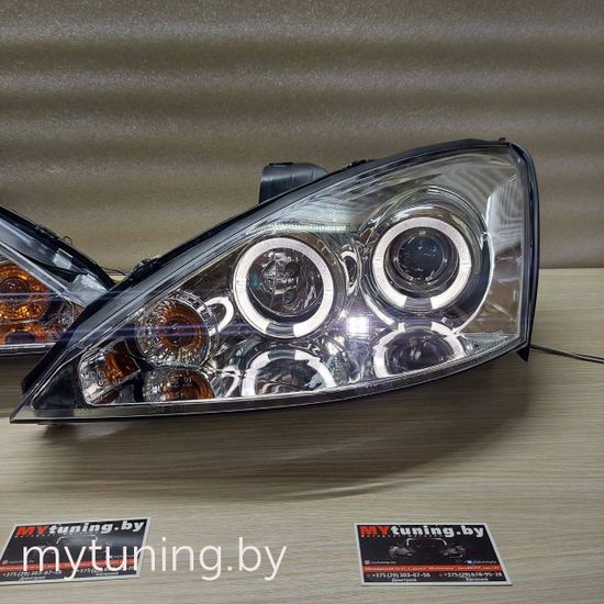 Передние фары Ford Focus 1 angel eyes chrome
