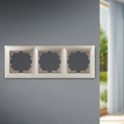 Рамка для розеток и выключателей Intro Solo 4-503-04 на 3 поста, СУ, шампань