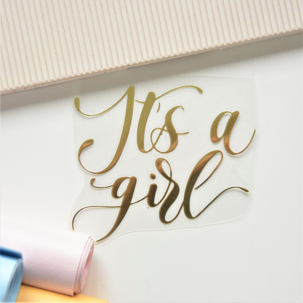 Надпись из термотрансферной пленки "It's a girl"