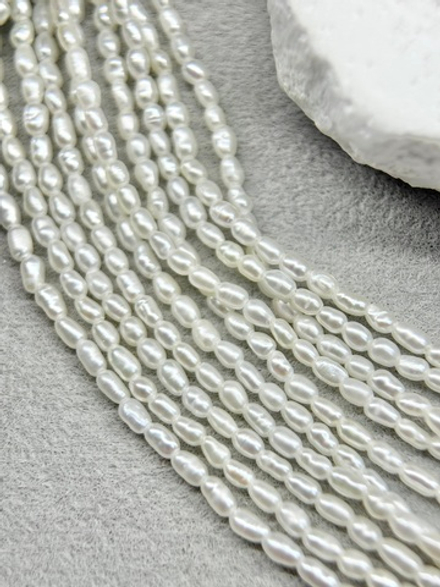 Натуральный барочный жемчуг супермелкий 1,5-2 мм, кремовый, нить 18 см