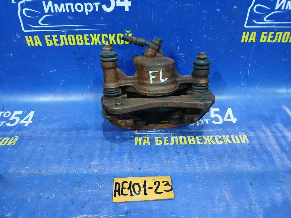 Суппорт тормозной передний левый TOYOTA CERES 1992