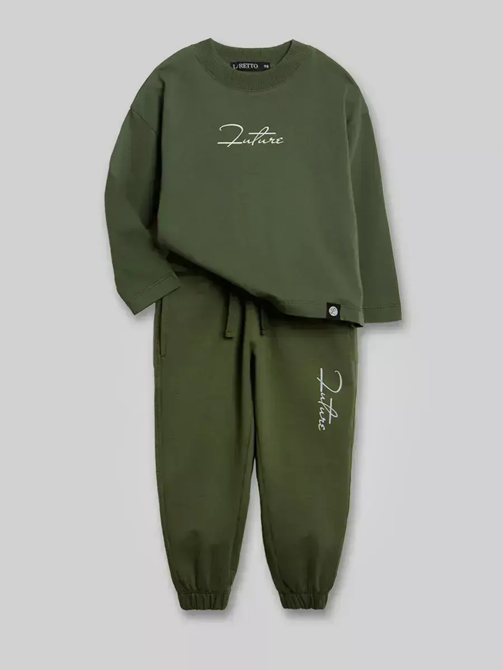 Зеленый костюм для мальчика в школу