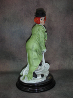 Статуэтка. Фарфор. Клоун на самокате. Capodimonte. Италия