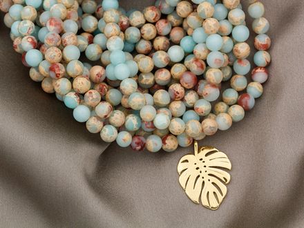 Нить бусин из варисцита 6,4мм