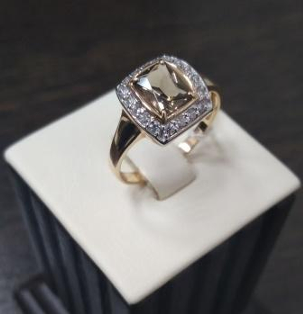 Кольцо из золота с раух-топазами