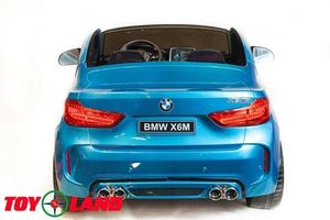 Детский электромобиль Toyland BMW X6M синий фото №8