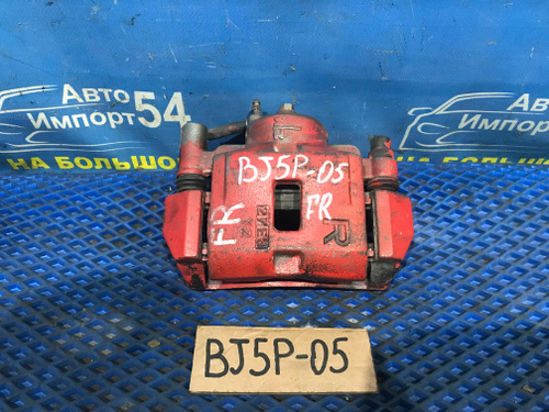 Суппорт тормозной передний правый MAZDA FAMILIA 2000