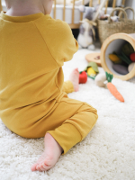 Комбинезон на манжетах Mjölk Sleep and Play Mustard, с рукавом реглан