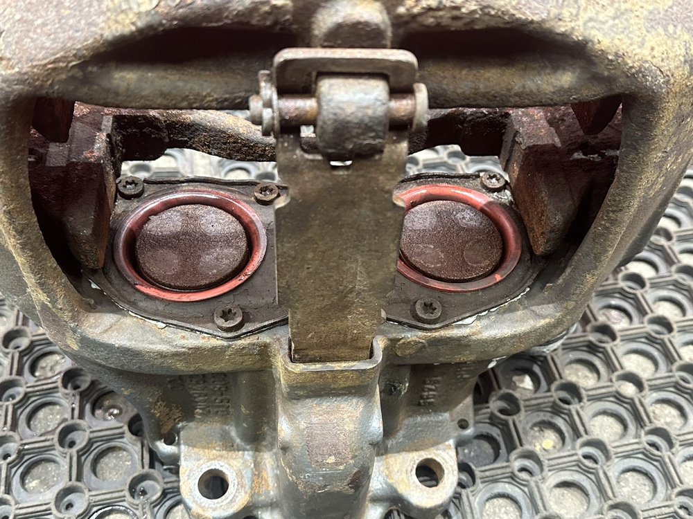 Суппорт задний левый