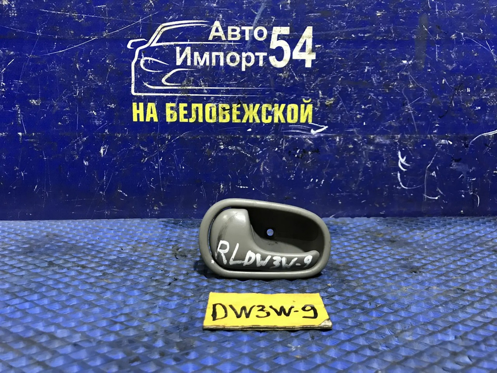 Ручка двери задней левой салонная MAZDA DEMIO 2000