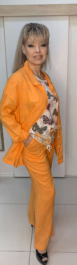 Льняные оранжевые брюки