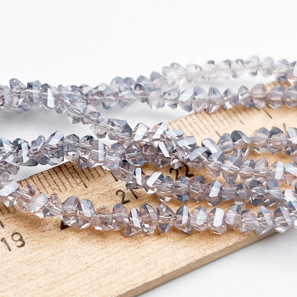 Бусина Треугольник, стекло, цвет серо-лиловый, размер около 3*4 мм, цена за нить 34 см