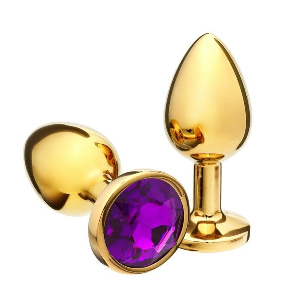 Золотистая анальная пробка с фиолетовым кристаллом - 8,5 см. (Цвет: фиолетовый)