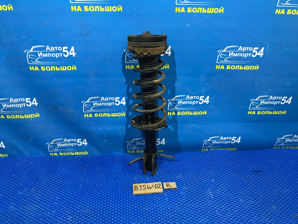 Стойка задняя левая MAZDA FAMILIA 2001