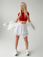 Юбка короткая однотонная на резинке с рюшами и вышитым узором