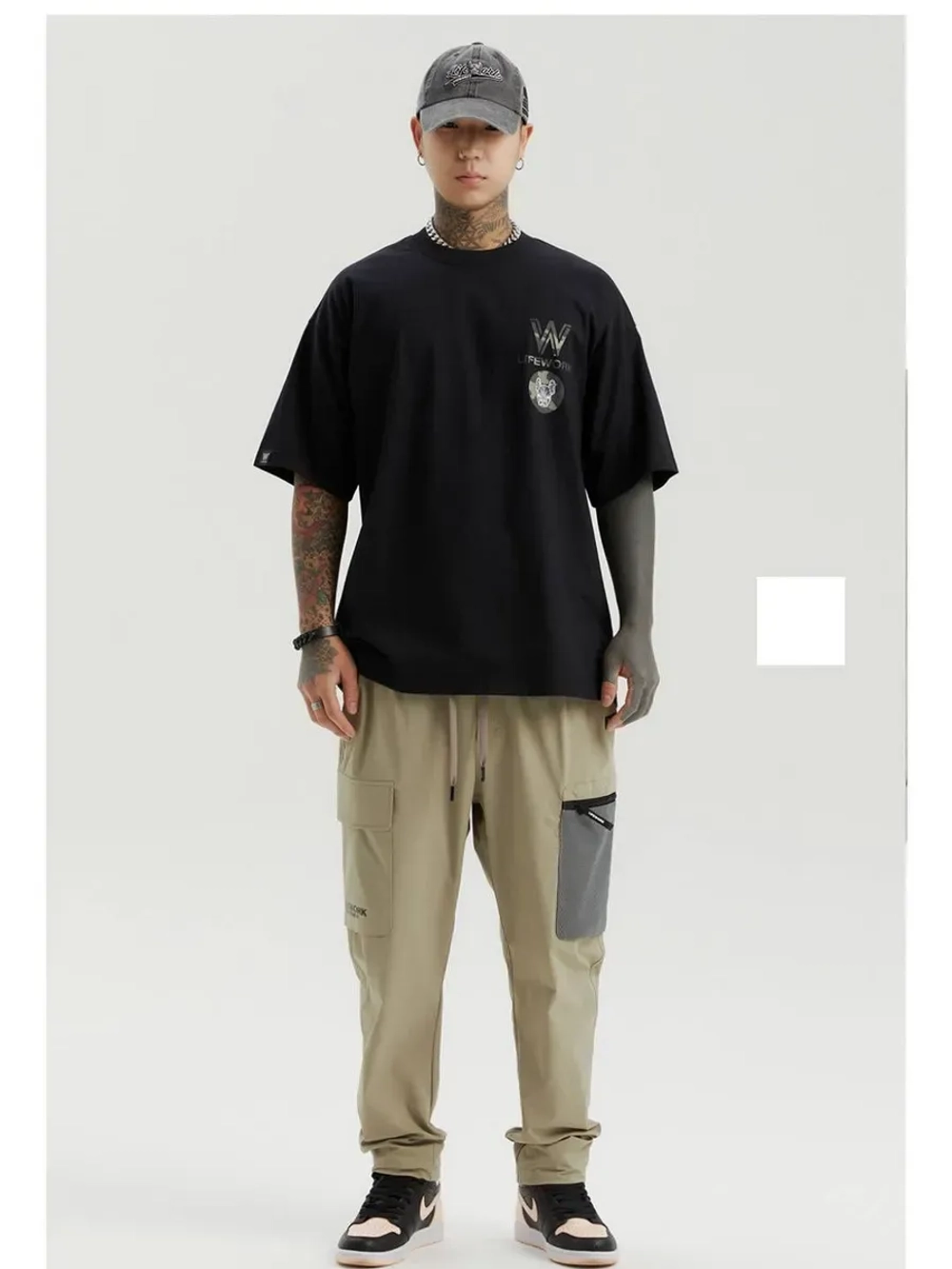 Брюки-карго с сетчатым карманом