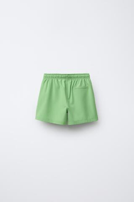 ZARA ПЛАВКИ КЛАССИЧЕСКОГО КРОЯ С НАДПИСЬЮ, ХАКИ