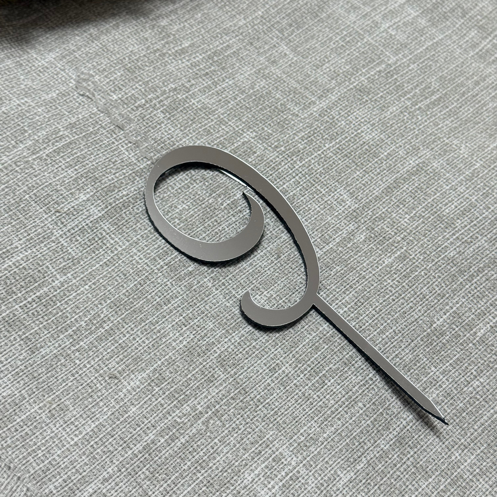 Свеча-топпер цифра «9» в серебряном цвете