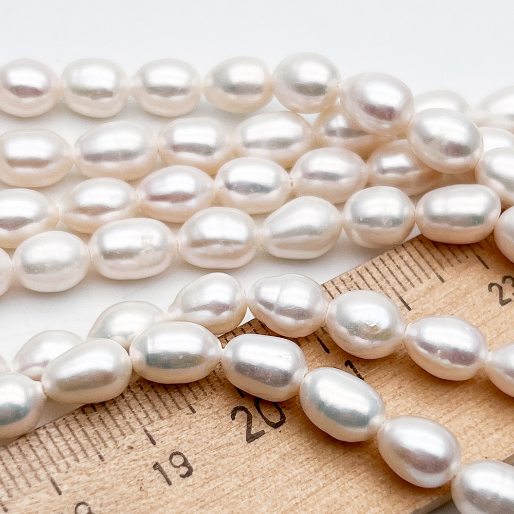 Жемчуг бусины, размер около 7,5-9*6-6,5 мм, цена за отрезок 18 см (1/2 нити)