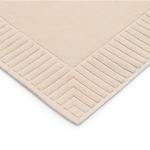 Коврик для ванной с фактурным бортиком кремового цвета из коллекции essential, 50x80 см