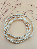 Длинное колье из жемчуга