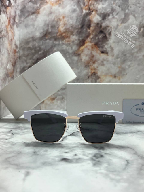 Солнечные очки Prada