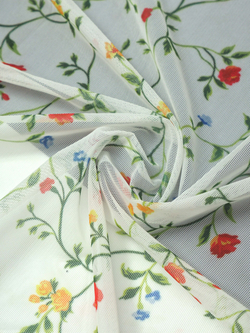 Сетка эластичная белая с зеленым цветочным принтом метражом