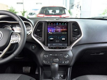 Магнитола для Jeep Cherokee 2014-2023 - Carmedia ZF-1018G-GE вертикальный экран 10.1" в стиле "Тесла" на Android 13, 8/128Гб, CarPlay, 4G SIM-слот